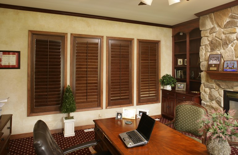 Wooden plantation shutters in a Gainesville home office